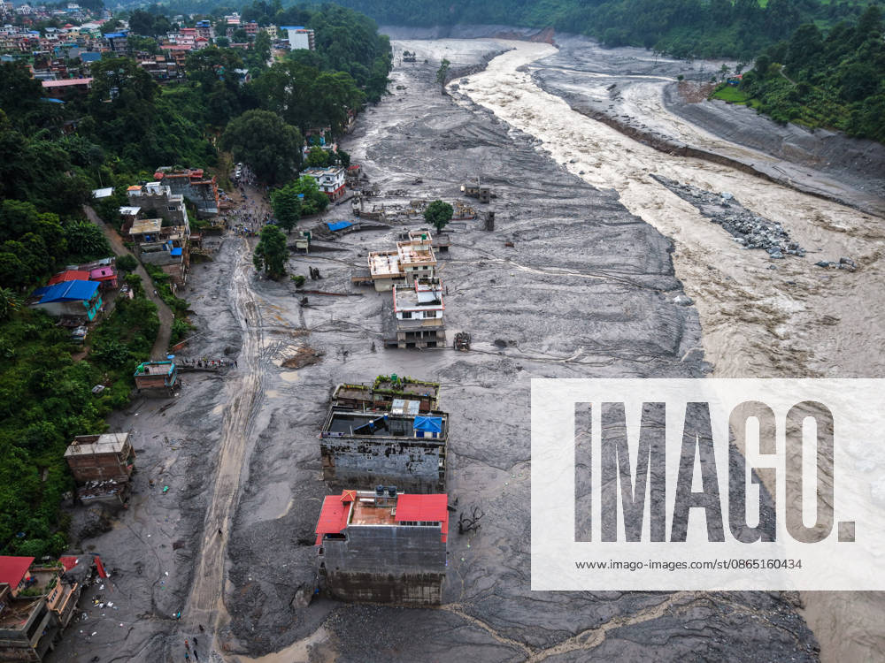Nepal-China flash flood death toll rises, hundreds remain missing NUWAKOT, NEPAL - AUGUST 28: An aerial view of destroyed houses and roads covered in muds along the Trishuli River, following landslide and flash floods in areas near the Nepal-China border, in Nuwakot, Nepal, on August 28, 2026. Death toll from the disaster has so far risen to more than 530, with hundreds of people missing, including foreign nationals from 32 countries such as China, Malaysia, South Korea, Australia, the United Kingdom, India and the United States. Daniel Ceng Anadolu Nuwakot Nepal. Editorial use only. Please get in touch for any other usage.