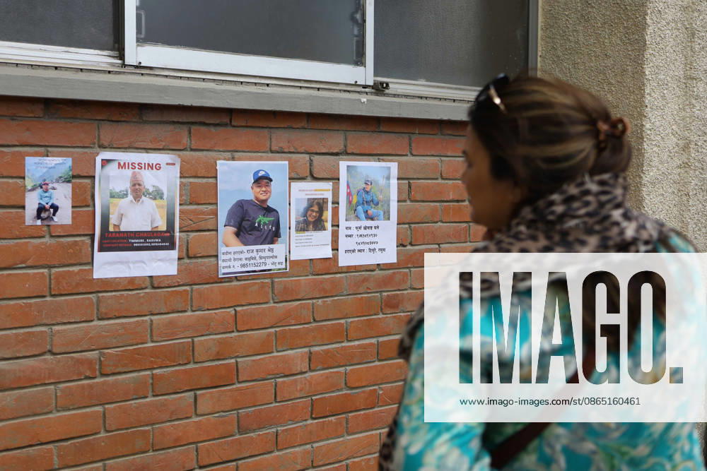 Rasuwa Floods Leave Hundreds Missing As Search For Victims Continues A family member looks at photographs of people missing after floods in Rasuwa, displayed at Tribhuvan University Teaching Hospital in Kathmandu, Nepal, on August 28, 2026. Families have gathered at the hospital seeking information about their missing loved ones following the floods and landslides. Kathmandu Nepal