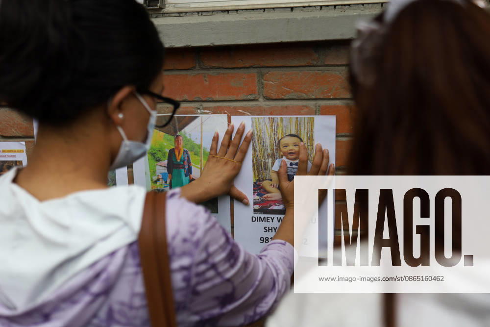 Rasuwa Floods Leave Hundreds Missing As Search For Victims Continues A family member displays a photograph of a missing relative at Tribhuvan University Teaching Hospital in Kathmandu, Nepal, on August 28, 2026. Families of people missing after floods and landslides in Rasuwa have come to the hospital seeking information about their loved ones. Kathmandu Nepal