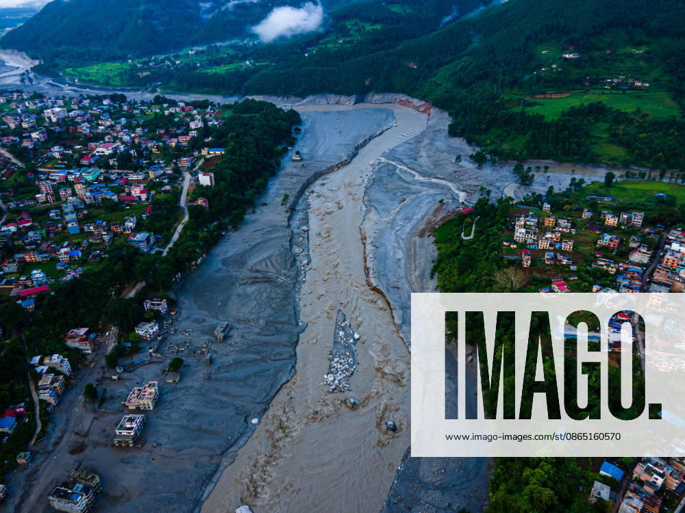Aerial View Shows Massive Flood Devastation Along The Bhotekoshi River, Nuwakot An aerial view shows the aftermath of flooding along the Bhotekoshi River, which affected low-lying areas and settlements near the riverbanks in Nuwakot, Nepal, on August 28, 2026. The flooding caused widespread damage to homes, roads, a bridge, a hydropower station and other infrastructure in the area. Several people remain missing as the number of casualties continues to develop. Rescue teams and security personnel are carrying out search and rescue operations in the affected areas. Nuwakot bagmati Nepal