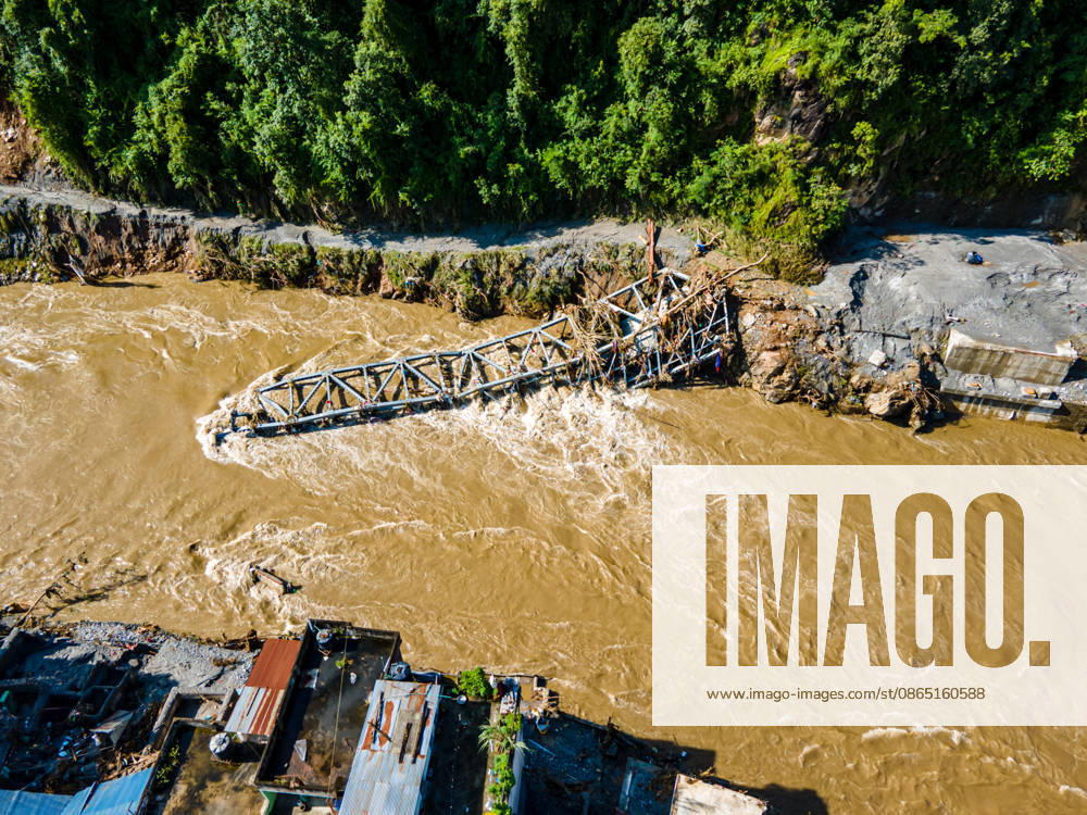 Aerial View Shows Massive Flood Devastation Along The Bhotekoshi River, Nuwakot An aerial view shows the aftermath of flooding along the Bhotekoshi River, which affected low-lying areas and settlements near the riverbanks in Nuwakot, Nepal, on August 28, 2026. The flooding caused widespread damage to homes, roads, a bridge, a hydropower station and other infrastructure in the area. Several people remain missing as the number of casualties continues to develop. Rescue teams and security personnel are carrying out search and rescue operations in the affected areas. Nuwakot bagmati Nepal
