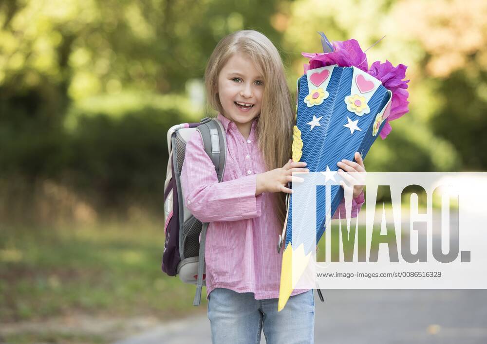 Little girl with school bag model released