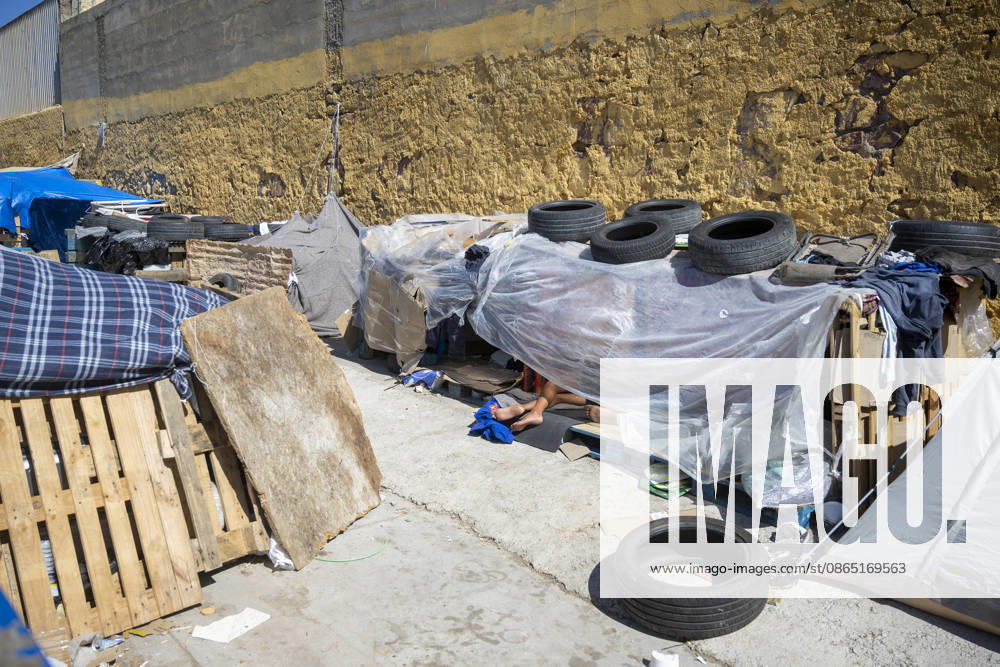 Daily Life for Migrants at the El Tarajal Industrial Park: Makeshift shelters built by migrants at the El Tarajal Industrial Park, August 28, 2026, in Ceuta, Spain. Ceuta has announced plans to renovate the six industrial buildings in the El Tarajal industrial park to transform them into a reception center. The project includes the installation of restrooms, kitchens, bedrooms, and other facilities. Depending on the condition of each building, the project will also require the replacement of roofs, painting, and other repairs. AUGUST 28, 2026 MIGRATION CRISIS Ceuta, Spain