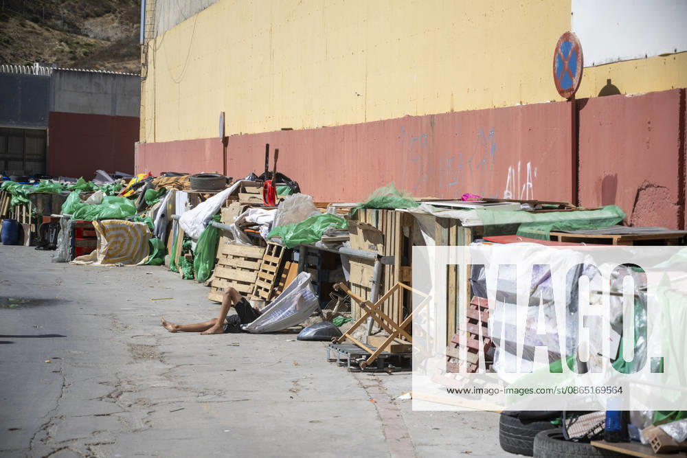 Daily Life for Migrants at the El Tarajal Industrial Park: Makeshift shelters built by migrants at the El Tarajal Industrial Park, August 28, 2026, in Ceuta, Spain. Ceuta has announced plans to renovate the six industrial buildings in the El Tarajal industrial park to transform them into a reception center. The project includes the installation of restrooms, kitchens, bedrooms, and other facilities. Depending on the condition of each building, the project will also require the replacement of roofs, painting, and other repairs. AUGUST 28, 2026 MIGRATION CRISIS Ceuta, Spain