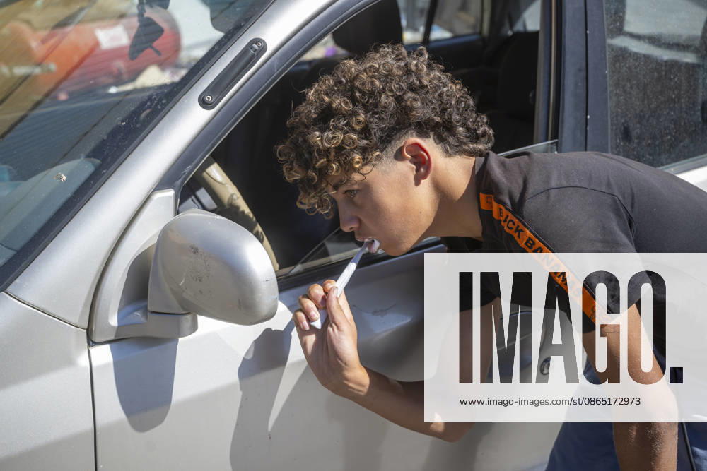 Daily Life for Migrants in the El Tarajal Industrial Park A person brushes their teeth on the street in the El Tarajal Industrial Park on August 28, 2026, in Ceuta, Spain. Ceuta has announced plans to renovate the six industrial warehouses in the El Tarajal industrial park to transform them into a reception center. The project includes the installation of restrooms, kitchens, bedrooms, and other facilities. Depending on the condition of each warehouse, the project will also require the replacement of roofs, painting, and other repairs. AUGUST 28, 2026 MIGRATION CRISIS Ceuta, Spain