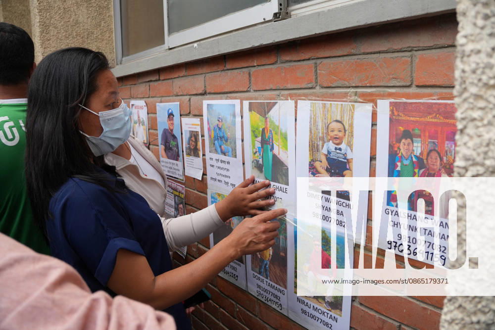 Families Seek Missing Relatives After Devastating Mudslide - Nepal Relatives examine photographs of individuals reported missing following devastating flash floods in Nepal, displayed outside Tribhuvan University Teaching Hospital in Kathmandu, Nepal on August 28, 2026. Photo by Sunil Pradhan ABACAPRESS.COM Kathmandu Bagmati Nepal