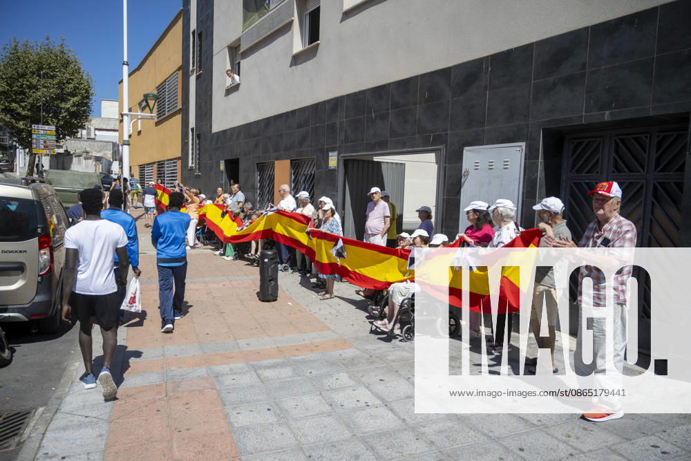 Residents of a social and health care center in Ceuta denounce the lack of safety on the streets. Patients and staff hold up a Spanish flag during a demonstration to denounce the lack of safety on the streets, on August 28, 2026, in Ceuta, Spain. Staff members and patients at the Casa Familiar Nuestra Senora de los Ángeles hold a rally outside the facility to protest the growing lack of safety on the streets caused by the massive influx of migrants. AUGUST 28, 2026. MIGRATION CRISIS. Ceuta Ceuta, Spain