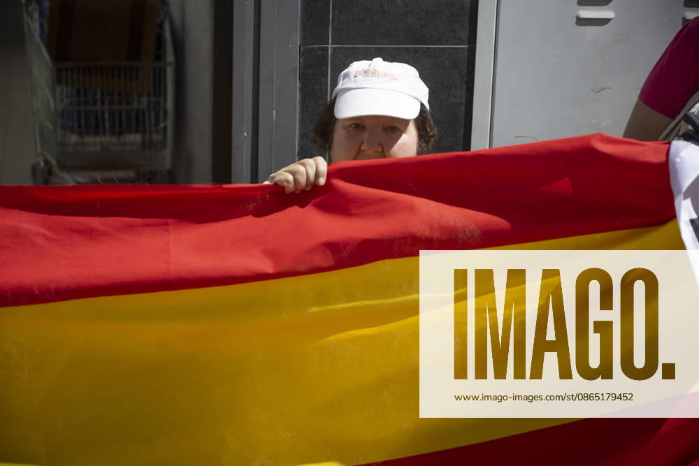 Residents of a social and health care center in Ceuta denounce the lack of safety on the streets. Patients and staff hold up a Spanish flag during a demonstration to denounce the lack of safety on the streets, on August 28, 2026, in Ceuta, Spain. Staff members and patients at the Casa Familiar Nuestra Senora de los Ángeles hold a rally outside the facility to protest the growing lack of safety on the streets caused by the massive influx of migrants. AUGUST 28, 2026. MIGRATION CRISIS. Ceuta Ceuta, Spain