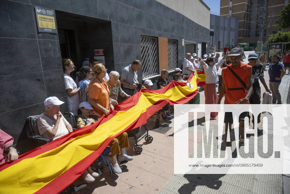 Residents of a social and health care center in Ceuta denounce the lack of safety on the streets. Patients and staff hold up a Spanish flag during a demonstration to denounce the lack of safety on the streets, on August 28, 2026, in Ceuta, Spain. Staff members and patients at the Casa Familiar Nuestra Senora de los Ángeles hold a rally outside the facility to protest the growing lack of safety on the streets caused by the massive influx of migrants. AUGUST 28, 2026. MIGRATION CRISIS. Ceuta Ceuta, Spain