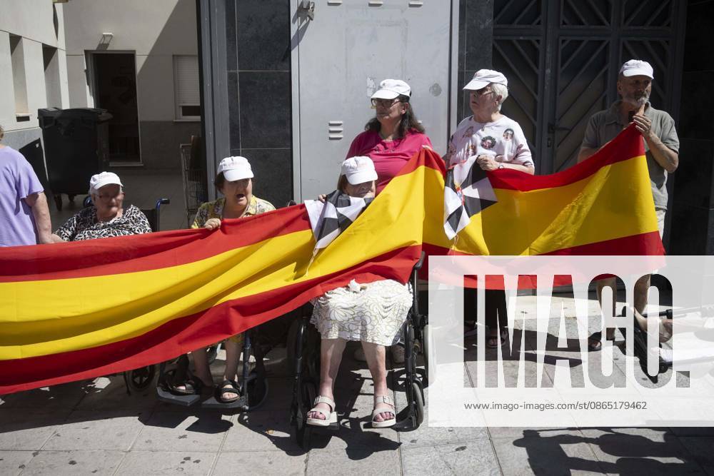 Residents of a social and health care center in Ceuta denounce the lack of safety on the streets. Patients and staff hold up a Spanish flag during a demonstration to denounce the lack of safety on the streets, on August 28, 2026, in Ceuta, Spain. Staff members and patients at the Casa Familiar Nuestra Senora de los Ángeles hold a rally outside the facility to protest the growing lack of safety on the streets caused by the massive influx of migrants. AUGUST 28, 2026. MIGRATION CRISIS. Ceuta Ceuta, Spain