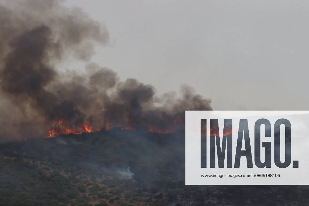 Algeria battles scores of wildfires that have killed 12, injured dozens JIJEL, ALGERIA - AUGUST 28: (---- - MANDATORY CREDIT - ALGERIAN GENERAL DIRECTORATE OF CIVIL PROTECTION HANDOUT - NO MARKETING NO ADVERTISING CAMPAIGNS - DISTRIBUTED AS A SERVICE TO CLIENTS----) Smoke and flames rise as Algerian Civil Protection firefighters and emergency personnel conduct ground operation to battle a raging forest fire in the mountainous countryside near Jijel, Algeria, on August 28, 2026. Sixty-four wildfires were still burning across 10 Algerian provinces on Friday, most of them in the eastern Jijel province, after authorities extinguished 110 out of 174 fires that erupted nationwide over the past 24 hours. Algerian General Dire