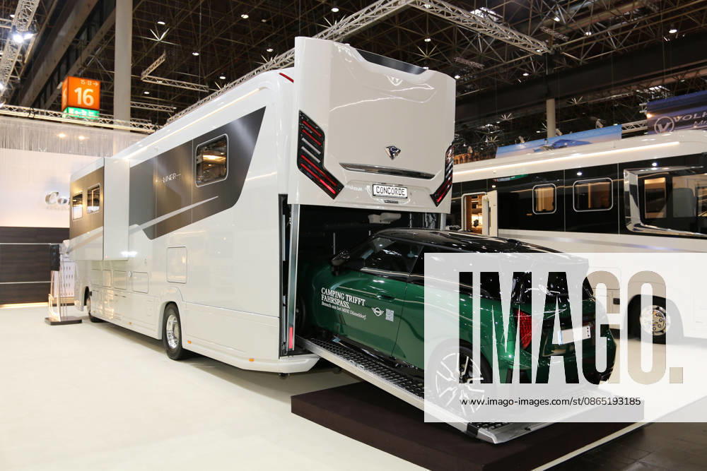 Concorde Liner 1090 GI Atego luxury motorhome with a Mini Cooper SE on the ramp leading to the rear garage, Caravan Salon Düsseldorf, August 28, 2026, Messe Düsseldorf, the world’s leading trade fair for mobile travel, the world’s largest trade fair for motorhomes and caravans, camping and caravaning, mobile vacations, Düsseldorf D