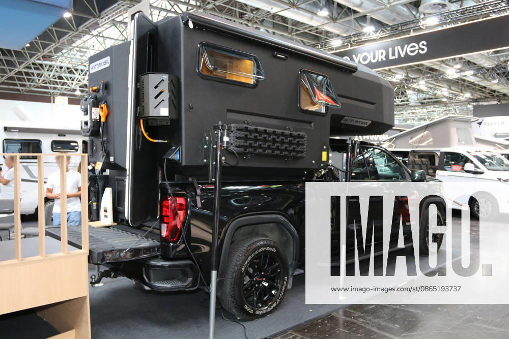 Hotomobil Gladiator XL on a GMC Sierra 1500 Elevation pickup with Duramax turbodiesel engine, Caravan Salon Düsseldorf, August 28–September 6, 2026, Messe Düsseldorf, the world’s leading trade fair for mobile travel, the world’s largest trade fair for motorhomes and travel trailers, camping and caravanning, mobile vacations, Düsseldorf D