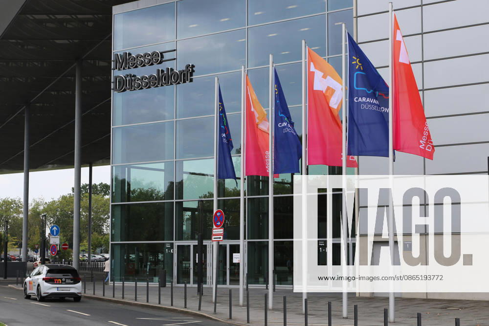Flags in front of the South Entrance to Messe Düsseldorf, Caravan Salon Düsseldorf August 28–September 6, 2026, Messe Düsseldorf, the world’s leading trade fair for mobile travel, the world’s largest trade fair for motorhomes and caravans, camping and caravanning, mobile vacations, Düsseldorf D