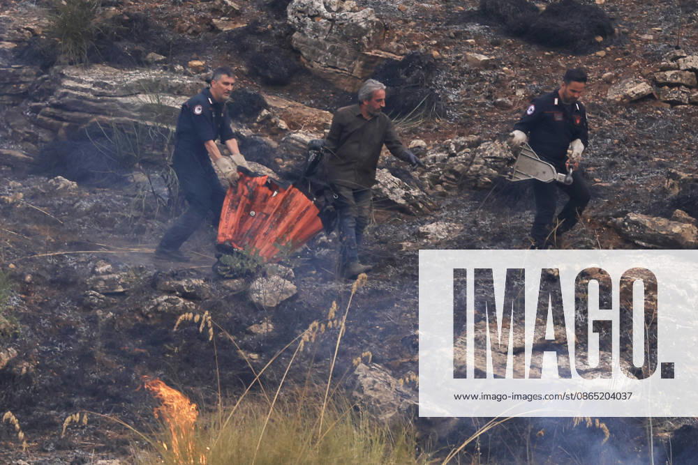 Wildfire suppression efforts continue on Italy s Sicily and Sardinia islands PALERMO, ITALY - AUGUST 28: Firefighting teams and forestry workers respond to tackle a wildfire from the ground with water tankers, while the gendarmerie intervened from the air with a helicopter, in Pianetto, near Palermo, Italy on August 28, 2026. Alberto Lo Bianco Anadolu Palermo Italy. Editorial use only. Please get in touch for any other usage.