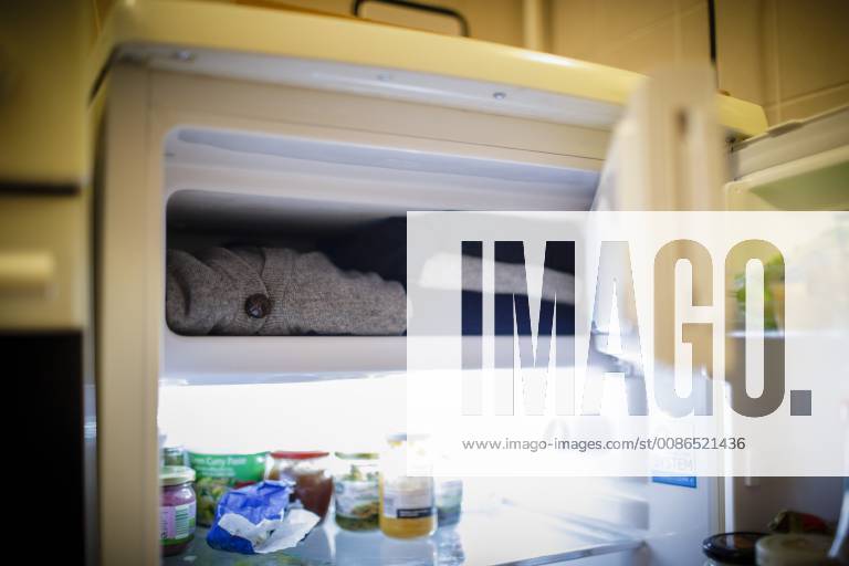 Wool pullovers lying in a freezer compartment so that the clothes moths larvae are destroyed 28 10 2018 Berlin Berlin Germany