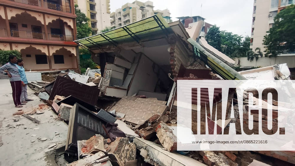A portion of Swaminarayan Temple collapsed in Prayagraj Prayagraj, Aug 29 (ANI): People look at the debris after a portion of the Swaminarayan temple collapsed into a deep crater caused by heavy rainfall, in Prayagraj on Saturday. Prayagraj Uttar Pradesh India