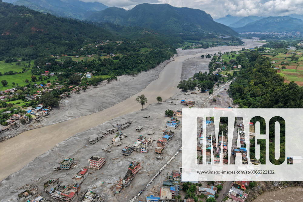Deaths, missing numbers rise amid aftermath of Nepal-China flash floods DEVIGHAT, NEPAL - AUGUST 29: An aerial photo shows houses at a town along the Trishuli River destroyed by the flash floods, amid increasing deaths and missing people, in Devighat, Nuwakot, Nepal, on August 29, 2026. More than 2,000 people remain missing while hundreds of people have died, following the flash flood and landslide near the Nepal-China border earlier. Among the missing foreign nationals include those from China, India, the United States, Australia, the United Kingdom and South Korea. Daniel Ceng Anadolu Devighat Nepal. Editorial use only. Please get in touch for any other usage.