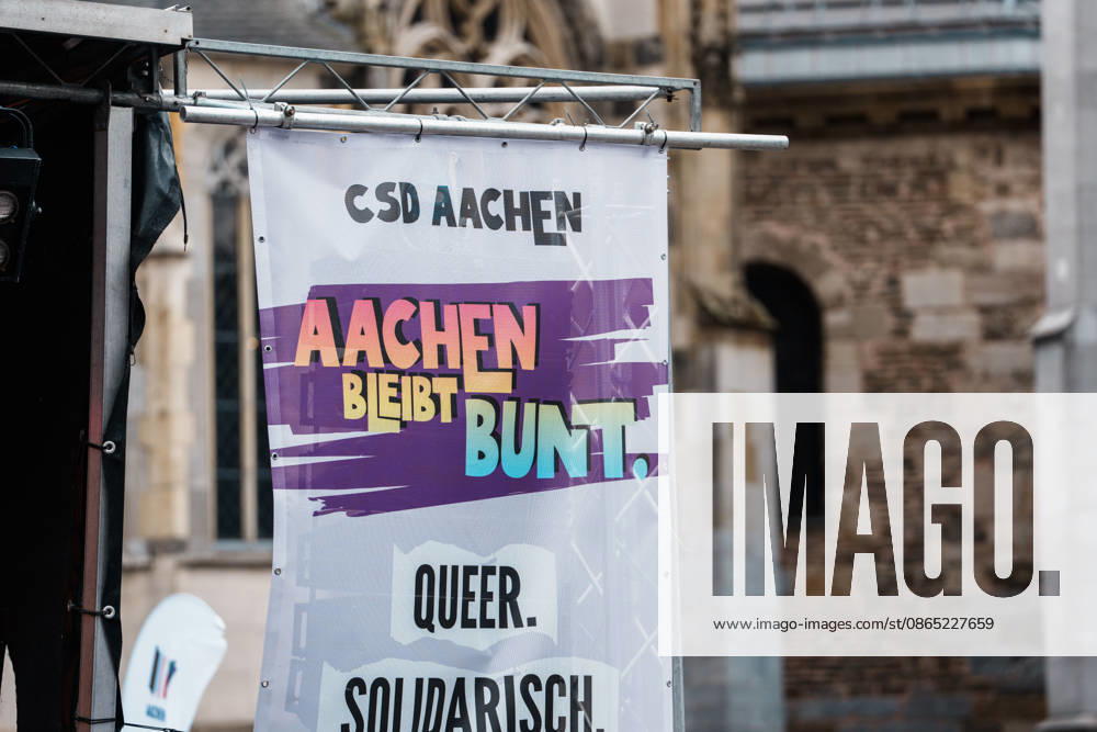 Germany, Aachen CSD, Aachen Pride 2026, Christopher Street Day, parade, equality, anti-queer sentiment, trans rights, equal rights, banners, Aachen Remains Colorful in front of Aachen Cathedral