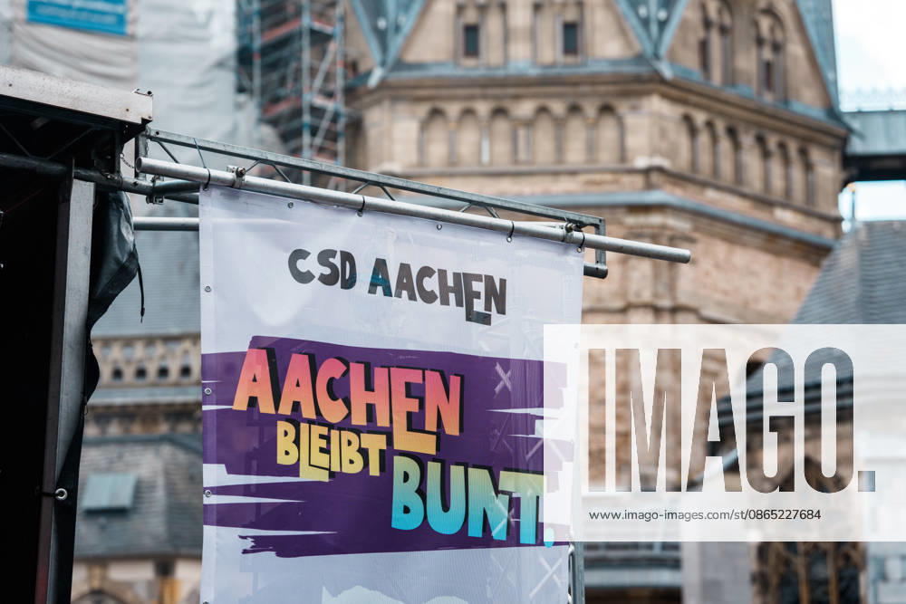 Germany, Aachen CSD, Aachen Pride 2026, Christopher Street Day, parade, equality, anti-queer sentiment, trans rights, equal rights, banners, Aachen Remains Colorful in front of Aachen Cathedral