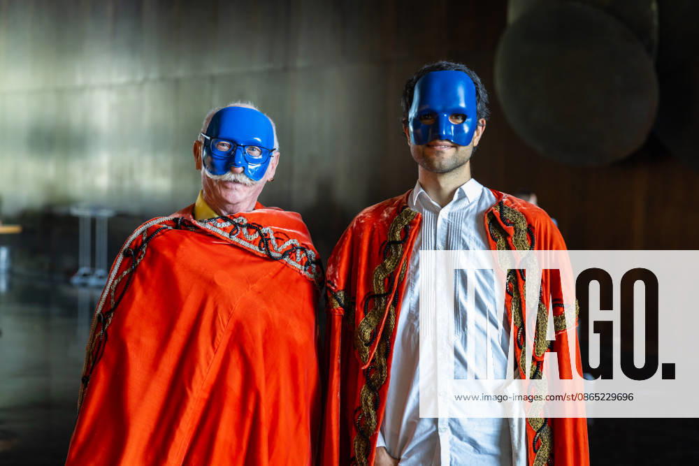 Costume Parade at the Deutsche Oper Berlin, Germany, Berlin, August 29, 2026. With the slogan Unless the People Live Here, the Deutsche Oper Berlin kicked off its new season. Numerous visitors dressed up in costumes from the opera’s wardrobe. Two men wearing masks and red capes in the foyer of the Deutsche Oper Berlin