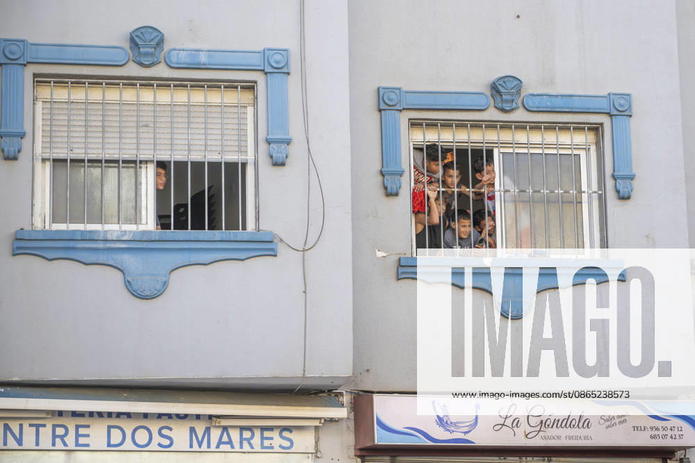 Peaceful demonstration organized by neighborhood associations in Ceuta A group of children watches from the window of an apartment during a peaceful demonstration on August 29, 2026, in Ceuta, Spain. The demonstration, which was distinctly peaceful in nature, was organized by several neighborhood associations under the slogan Ceuta United, Ceuta at Peace. Another march planned for tonight was ultimately canceled by its organizers to prevent people who incite violence from joining them, as they were alerted to the possible arrival of extremist groups. AUGUST 29, 2026 Ceuta, Spain