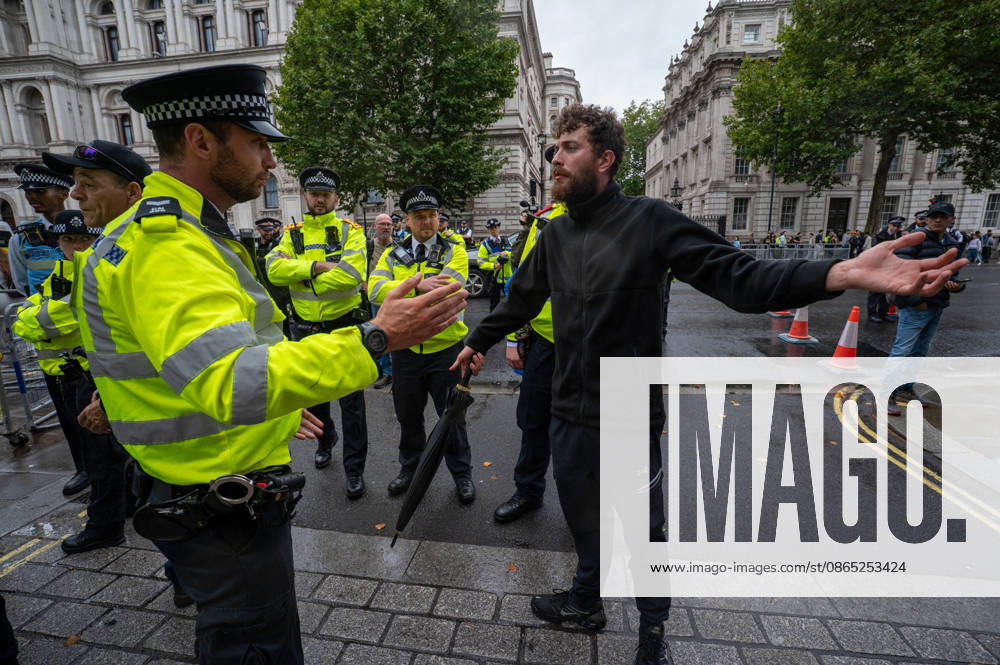 A UKIP supporter confronts police officers during the No to Sharia march and rally in central London. UKIP leader Nick Tenconi led supporters on a march and rally through central London calling for an end to Sharia law in Great Britain. The demonstration, organized under the banner No to Sharia Law, was met by a counter-protest. Tensions rose at the start of the march, with counter-protesters pushing against police officers as officers attempted to keep the opposing groups apart. The Metropolitan Police had imposed conditions on both demonstrations to prevent serious disorder. London United Kingdom - ZUMAs197 20260829_aaa_s197_182