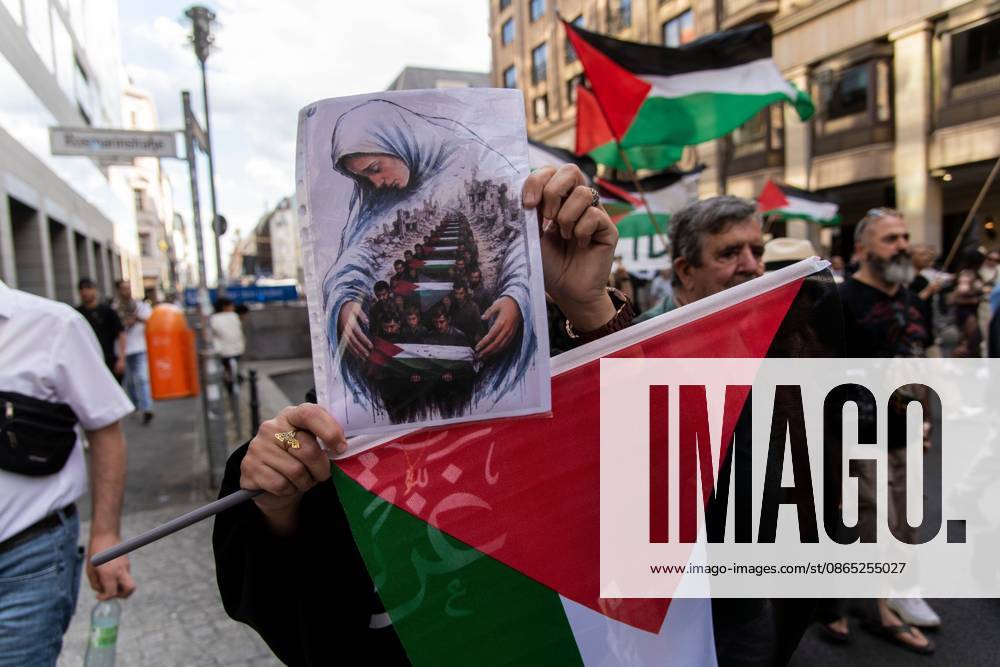 BERLIN, GERMANY, AUGUST 29, 2026: Hundreds of people take part in a pro-Palestinian demonstration in central Berlin, criticizing the German government s policy toward Israel and its position on the war in Gaza. Police in riot gear accompany the march, which is led by members of the Palestinian diaspora. The demonstration concludes near Berlin City Hall, where participants display an installation commemorating children killed in Gaza, including a vehicle presented in reference to Hind Rajab, a Palestinian girl killed in Gaza in 2024. Berlin Germany - ZUMAq101 20260829_zna_q101_175