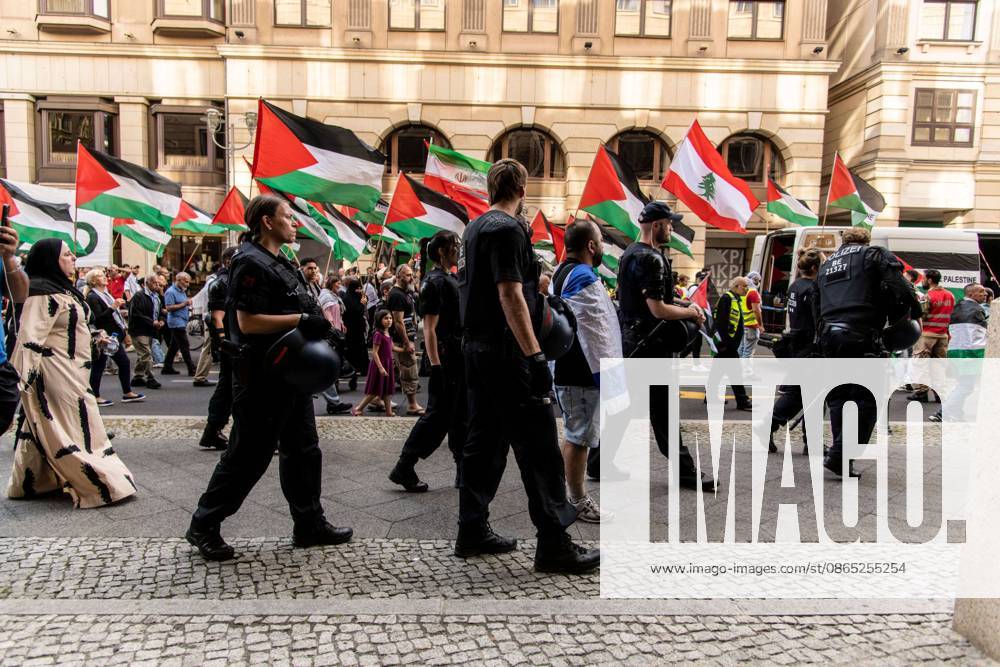 BERLIN, GERMANY, AUGUST 29, 2026: Hundreds of people take part in a pro-Palestinian demonstration in central Berlin, criticizing the German government s policy toward Israel and its position on the war in Gaza. Police in riot gear accompany the march, which is led by members of the Palestinian diaspora. The demonstration concludes near Berlin City Hall, where participants display an installation commemorating children killed in Gaza, including a vehicle presented in reference to Hind Rajab, a Palestinian girl killed in Gaza in 2024. Berlin Germany - ZUMAq101 20260829_zna_q101_180