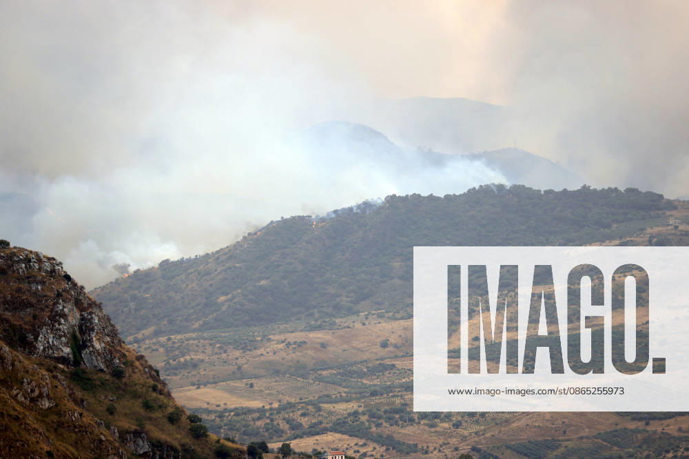 Wildfires on Italy s Sicily island threaten residential areas PALERMO, ITALY - AUGUST 29: Wildfires broke out at several locations threatened residential areas in some parts on Italy s southern island of Sicily, on August 29, 2026. Near the city of Palermo, a fire that started yesterday afternoon in the maquis shrubland stretching between the town of Ciminna and Ventimiglia di Sicilia affected a wide area. Firefighting teams responded to bring the fire under control, working from the ground with water tankers and from the air with firefighting planes and helicopters. One person injured in the fire was transported to hospital by air ambulance helicopter, while many others were forced to leave their homes along with their animals due to the f