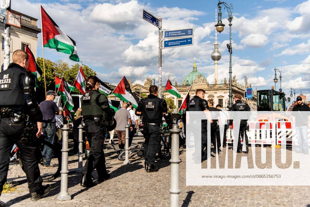 BERLIN, GERMANY, AUGUST 29, 2026: Hundreds of people take part in a pro-Palestinian demonstration in central Berlin, criticizing the German government s policy toward Israel and its position on the war in Gaza. Police in riot gear accompany the march, which is led by members of the Palestinian diaspora. The demonstration concludes near Berlin City Hall, where participants display an installation commemorating children killed in Gaza, including a vehicle presented in reference to Hind Rajab, a Palestinian girl killed in Gaza in 2024. Berlin Germany - ZUMAq101 20260829_zna_q101_186