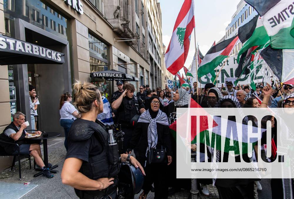 BERLIN, GERMANY, AUGUST 29, 2026: Hundreds of people take part in a pro-Palestinian demonstration in central Berlin, criticizing the German government s policy toward Israel and its position on the war in Gaza. Police in riot gear accompany the march, which is led by members of the Palestinian diaspora. The demonstration concludes near Berlin City Hall, where participants display an installation commemorating children killed in Gaza, including a vehicle presented in reference to Hind Rajab, a Palestinian girl killed in Gaza in 2024. Berlin Germany - ZUMAq101 20260829_zna_q101_189
