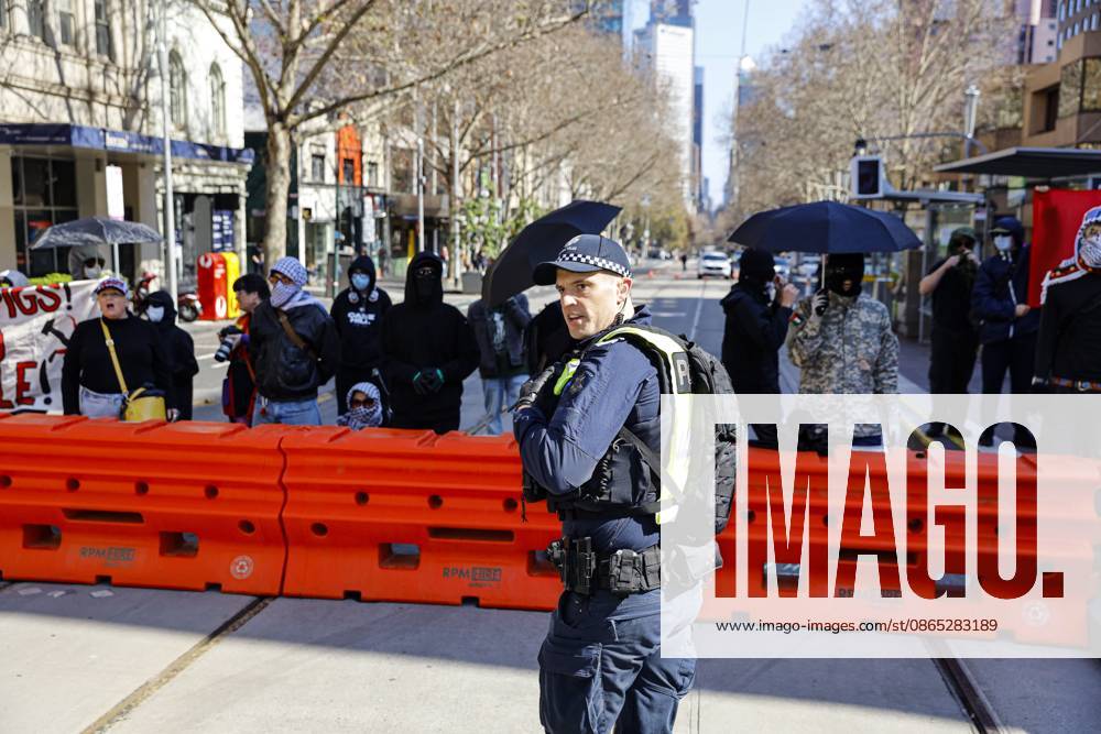 A Victoria Police officer is seen near the counter-protest..Hundreds of supporters of the far-right group March for Australia marched through Melbourneâ€⠢s CBD as part of a demonstration focused on freedom of speech and political expression, while counter-protesters gathered separately to oppose the march and its political messages. March for Australia organisers called for the repeal of laws they say restrict political communication, an end to government censorship and constitutional protection for freedom of speech. Melbourne Australia - ZUMAs197 20260830_aaa_s197_045
