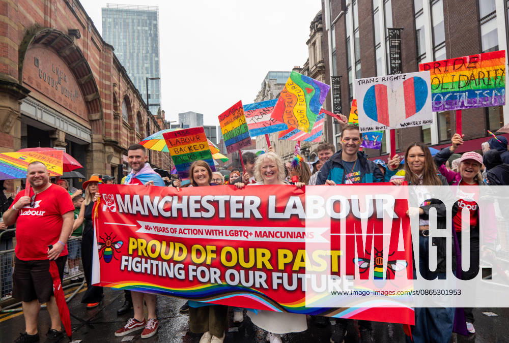 Manchester Labour pride group joins the pride parade. Revelers refused to let a heavy downpour dampen their spirits as the annual parade makes its way through the city centre. Despite the torrential rain, the LGBTQ+ community and supporters partied anyway, filling the streets with vibrant colour, music, and joy. The festival has been officially renamed Manchester Village Pride this year, marking a new community-led chapter after the voluntary liquidation and financial collapse of the former organizing company last autumn. Taking part in the celebrations, the newly elected Mayor of Greater Manchester, Bev Craig, actively engaged with parade participants and cheering crowds along the route through - ZUMAs197 20260829_aaa_s197_372