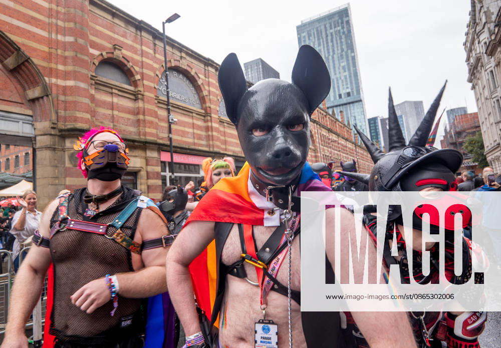 Human pups join the parade. Revelers refused to let a heavy downpour dampen their spirits as the annual parade makes its way through the city centre. Despite the torrential rain, the LGBTQ+ community and supporters partied anyway, filling the streets with vibrant colour, music, and joy. The festival has been officially renamed Manchester Village Pride this year, marking a new community-led chapter after the voluntary liquidation and financial collapse of the former organizing company last autumn. Taking part in the celebrations, the newly elected Mayor of Greater Manchester, Bev Craig, actively engaged with parade participants and cheering crowds along the route through central Manchester towards - ZUMAs197 20260829_aaa_s197_381