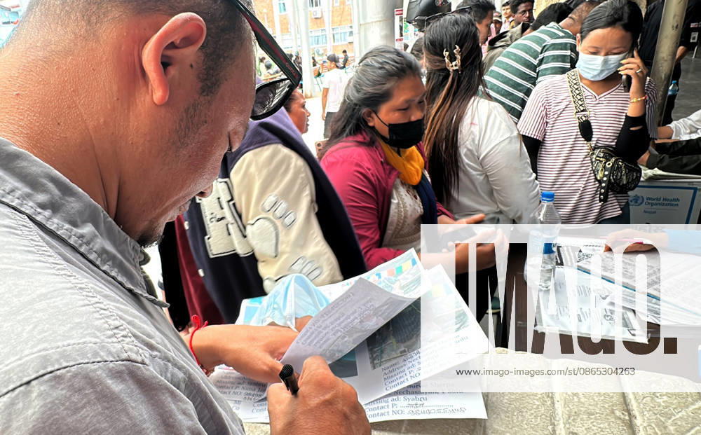 Relatives search for missing family members with police personnel, as photographs of missing people are displayed outside the hospital, four days after devastating flash floods struck areas near the Nepal-China border at Tribhuvan University Teaching Hospital in Maharajgunj, Kathmandu,Nepal on August 30, 2026. According to authorities, 734 people had died and 2,498 remained missing as morning of Aug. 30, 2026, following devastating flash floods that struck areas near the Nepal-China border on Aug. 26. Kathmandu Nepal - ZUMAs233 20260830_zap_s233_003