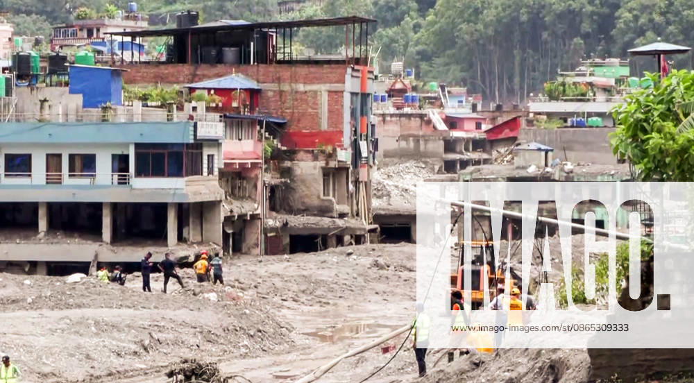 Debris Clearance Underway in Flood-Damaged Residential Area in Nuwakot Nuwakot Nepal , Aug 30 (ANI): Debris being cleared from a residential area damaged by a devastating flood, with heavy machinery including excavators and trucks deployed for ongoing cleanup operations at Trishuli, in Nuwakot on Sunday. (ANI Video Grab) Nuwakot Nepal