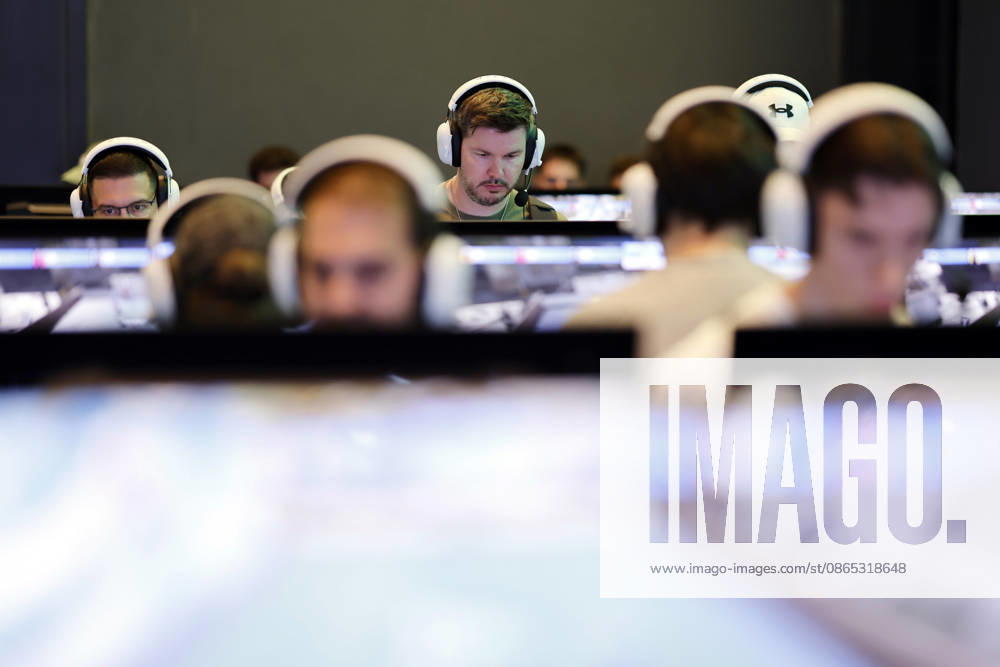 Visitors try out new video and computer games on screens at Gamescom 26, the world s largest computer game trade show, at Koelnmesse. Featured image, stock photo. Cologne, August 30, 2026. North Rhine-Westphalia, Germany