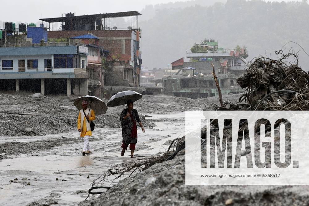 Aftermath of flash floods in Nepal Photo taken in Bidur, capital of Nepal s Nuwakot District, on Aug. 29, 2026, shows buildings submerged in mud after catastrophic flash floods along the Nepal-China border. A14AA0005626801P