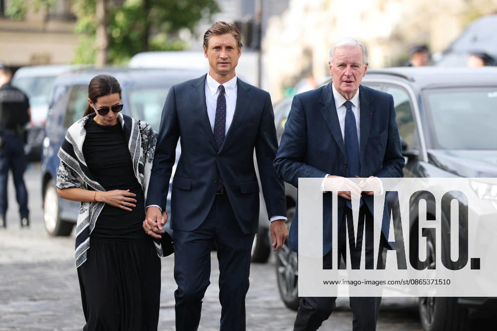 Nicolas Altmayer Funeral - Paris Michel Barnier, with his son Nicolas Barnier and his wife Isabelle Altmayer-Barnierduring the funeral of French film producer Nicolas Altmayer at Saint Germain des Pres church in Paris, France on August 31, 2026. He was the co-founder of Mandarin Compagnie, and died in a car accident with his partner, Dior executive Mathilde Favier on August 17, aged 61 and 57, respectively. Photo by Raphael Lafargue ABACAPRESS.COM Paris France