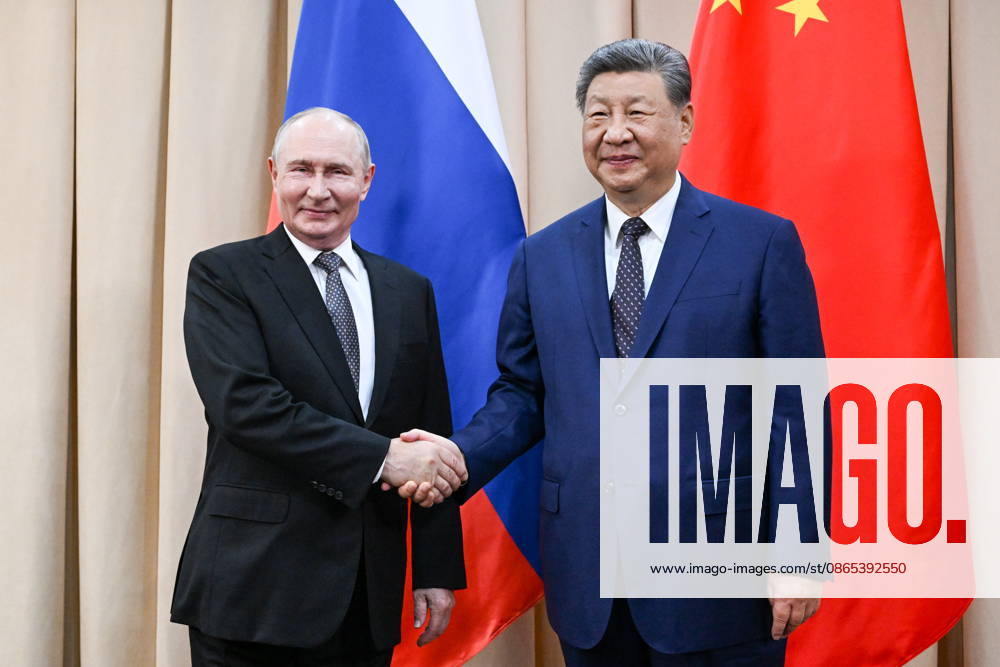 KYRGYZSTAN, BISHKEK - AUGUST 31, 2026: Russia’s President Vladimir Putin (L) and China s President Xi Jinping shake hands during a meeting at the Hyatt Regency Bishkek Hotel ahead of the 2026 SCO Summit. Konstantin Zavrazhin POOL TASS 96904196