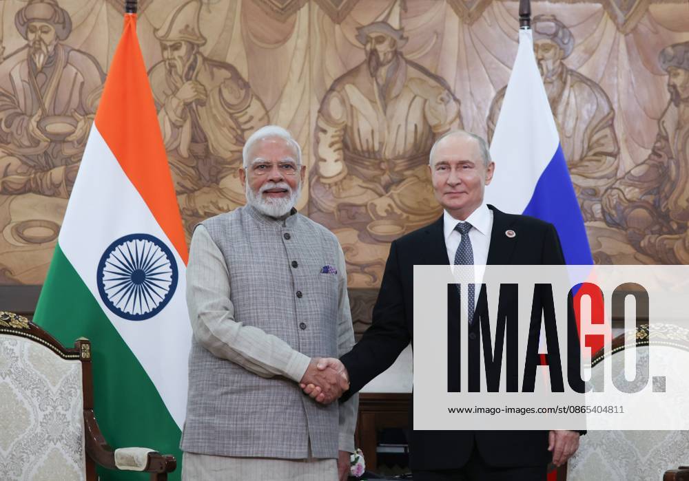 Kyrgyzstan Putin SCO Summit 9231822 31.08.2026 Indian Prime Minister Narendra Modi and Russian President Vladimir Putin shake hands as they pose for photos before a meeting on the sidelines of the Shanghai Cooperation Organization (SCO) summit in Bishkek, Kyrgyzstan. Petr Kovalev Sputnik Bishkek Kyrgyzstan