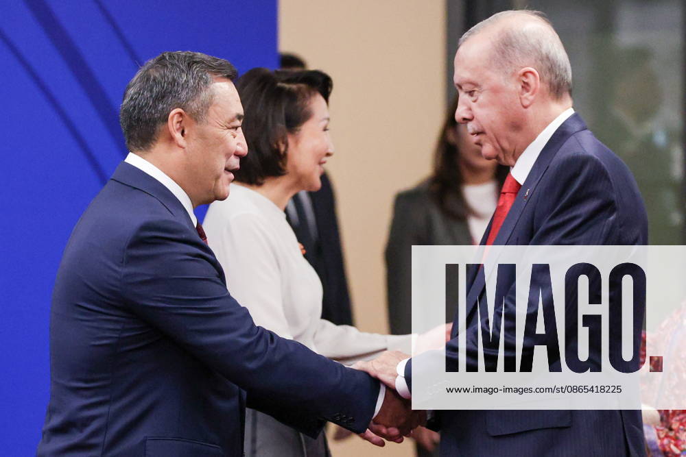 KYRGYZSTAN, BISHKEK - AUGUST 31, 2026: Sadyr Japarov (L), President of Kyrgyzstan, greets his counterpart Recep Tayyip Erdogan of Turkey during a ceremony to open the 2026 World Nomad Games at Bishkek Arena Bishkek Kyrgyzstan - ZUMAt113 20260831_zaa_t113_349
