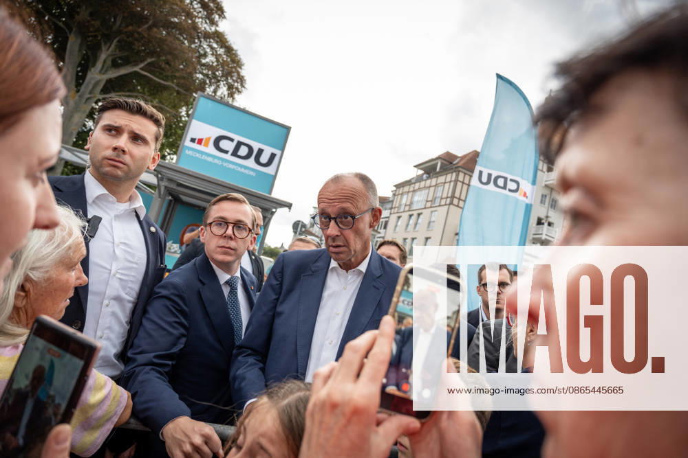 Chancellor Friedrich Merz with Philipp Amthor on the beach promenade in Kühlungsborn; the Chancellor and the CDU’s top candidate campaigning for the 2026 Mecklenburg-Western Pomerania state election in Kühlungsborn, Kühlungsborn, Mecklenburg-Western Pomerania, Germany; LOCATION