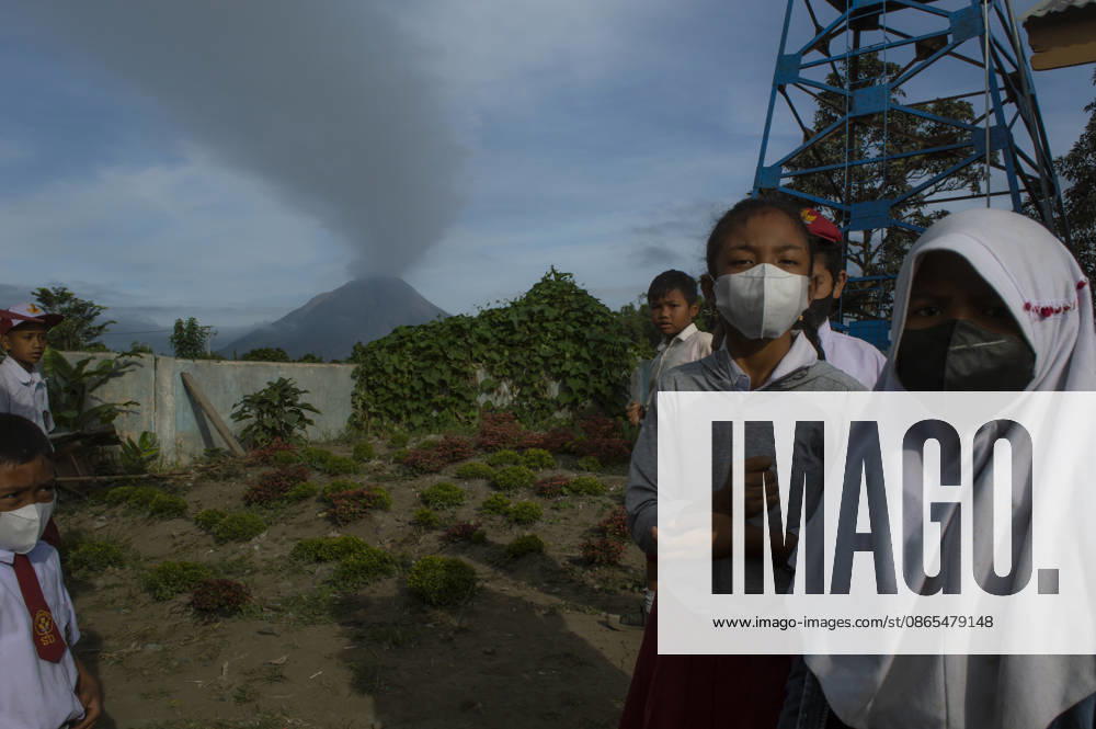 Sinabungs Renewed Ash Schoolchildren wear protective face masks while traveling to school in Gajah Village, Simpang Empat District, Karo Regency, North Sumatra, Indonesia, on September 1, 2026. The use of masks is a precautionary measure by local residents against airborne volcanic ash following renewed eruptive activity from Mount Sinabung on August 30, 2026. The volcano had previously been dormant for 400 years before entering a prolonged eruption period from 2010 until activity subsided in 2021. Karo, North Sumatra Indonesia