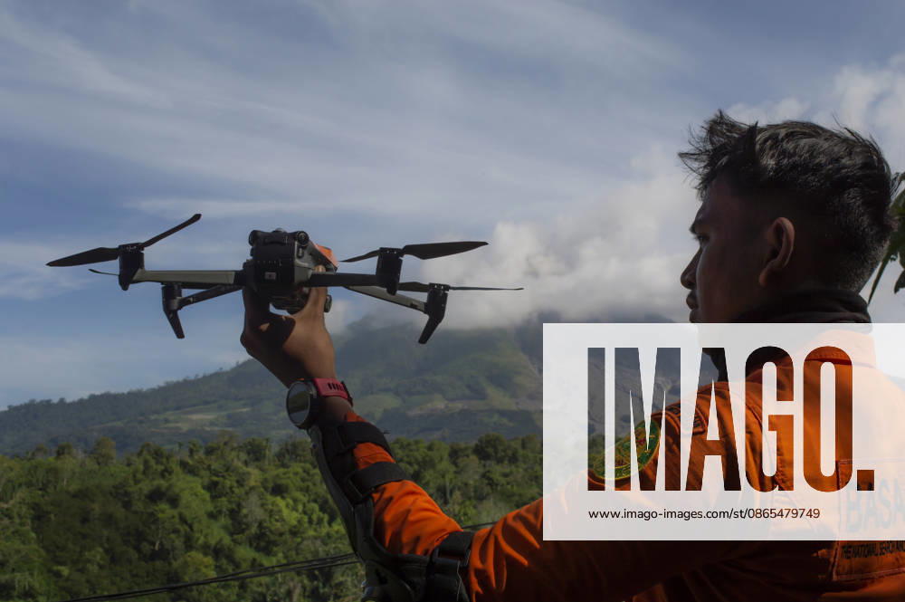 Sinabungs Renewed Ash A member of the National Agency for Search and Rescue (BASARNAS) launches a drone to monitor volcanic activity at Mount Sinabung, viewed from Simpang Empat District, Karo Regency, North Sumatra, Indonesia, on September 1, 2026. Aerial monitoring and mask precautions are implemented following renewed eruptive activity on August 30, 2026. The volcano had previously been dormant for 400 years before entering a prolonged eruption period from 2010 until activity subsided in 2021. Karo, North Sumatra Indonesia