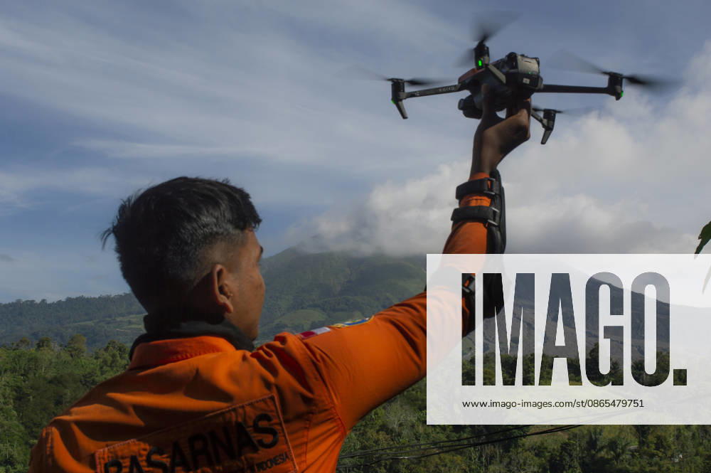 Sinabungs Renewed Ash A member of the National Search and Rescue Agency (BASARNAS) launches a drone to monitor volcanic activity at Mount Sinabung, viewed from Simpang Empat District, Karo Regency, North Sumatra, Indonesia, on September 1, 2026. Aerial monitoring and mask precautions are implemented following renewed eruptive activity on August 30, 2026. The volcano had previously been dormant for 400 years before entering a prolonged eruption period from 2010 until activity subsided in 2021. Karo, North Sumatra Indonesia