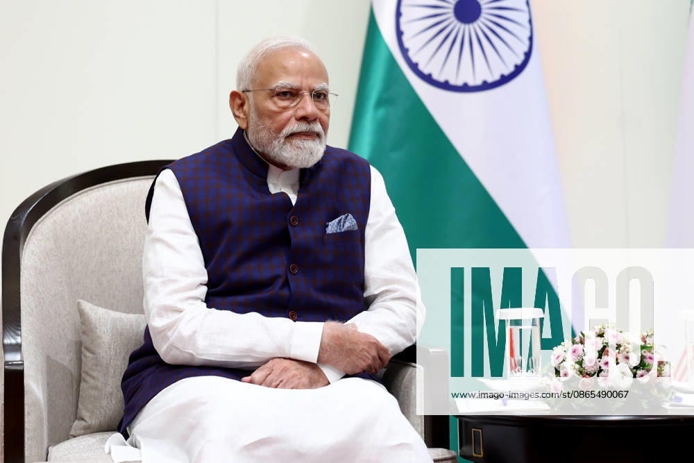 Indian Prime Minister Narendra Modi listens during a meeting with Iranian President Masoud Pezeshkian, unseen, on the sidelines of the Shanghai Cooperation Organisation summit in Bishkek, Kyrgyzstan, on August 31, 2026. The two leaders discussed bilateral relations and recent developments in West Asia, with both sides emphasizing diplomatic efforts toward regional peace and stability. Modi reiterated India s position that disputes should be resolved through dialogue and diplomacy and stressed the importance of protecting civilians, commercial shipping and freedom of navigation. Bishkek Kyrgyzstan - ZUMAi98_ 20260901_zih_i98_006