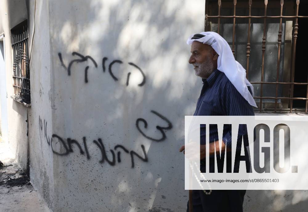 Fire damage and anti-Arab graffiti found at mosque near Nablus BAZARIYA, WEST BANK, PALESTINE, SEPTEMBER 1, 2026: Palestinians inspect fire damage and anti-Arab slogans written in Hebrew on the Imad al-Din Zenki Mosque in Bazariya village, north of Nablus in the occupied West Bank. BAZARIYA Palestine, State of