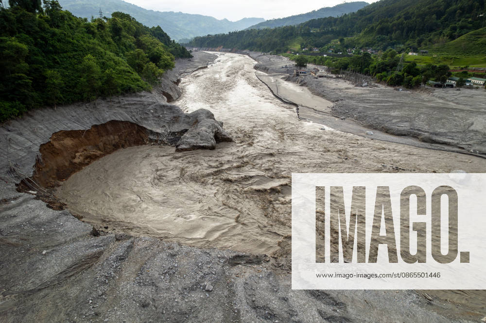 Flash floods leave trail of destruction in Nepal s Nuwakot District NUWAKOT, NEPAL - SEPTEMBER 1: A view of widespread destruction along the Trishuli River corridor following catastrophic flash floods that struck Nepal on August 26 is seen in Nuwakot District, Nepal, on September 1, 2026. Major sections of the Pasang Lhamu Highway were washed away, severely disrupting the main road connection between Nuwakot and Rasuwa and leaving several communities isolated. Homes, roads, businesses and critical infrastructure were damaged, buried under debris or swept away, while the Trishuli and Devighat hydropower projects and the Nuwakot Solar Power Plant were also severely affected. Rescue, recovery and road-clearance operations continue as authoriti
